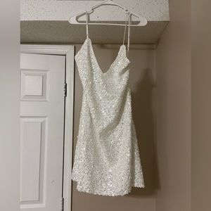 Lulu’s Force of Fashion White Backless Sequence Mini Dress